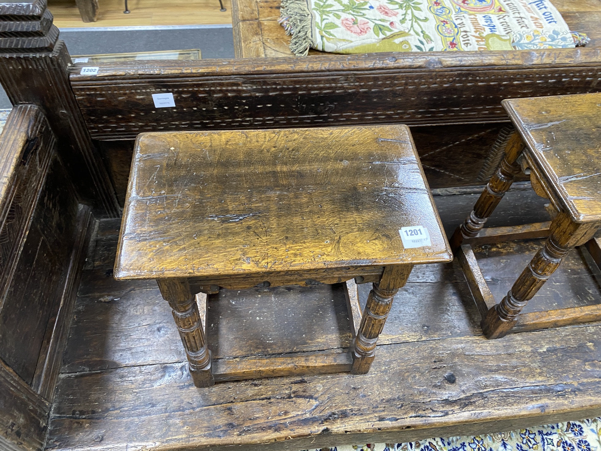 A pair of 17th century style rectangular carved oak joint stools, width 46cm, depth 28cm, height 47cm